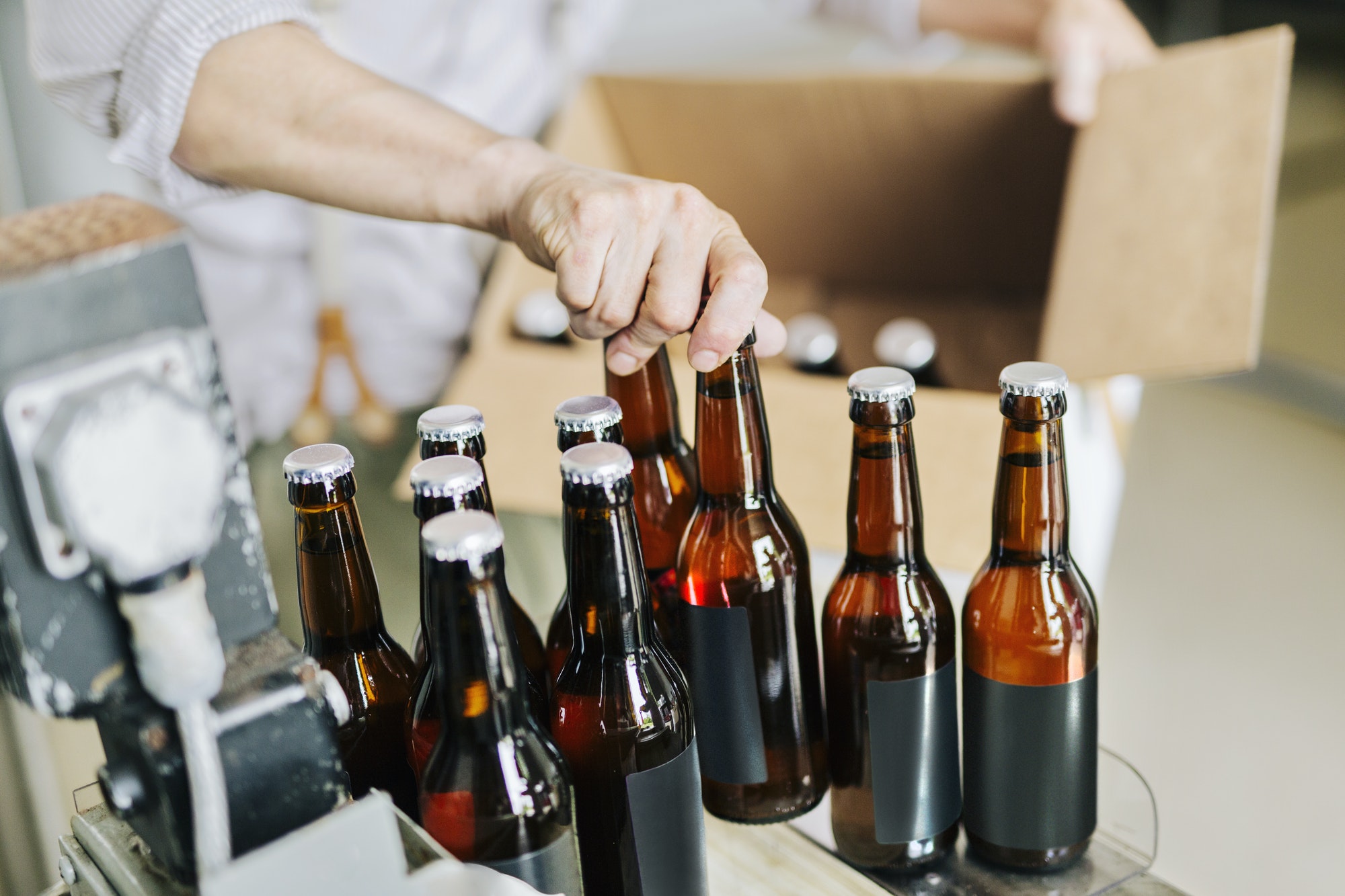 brewery-worker-preparing-beer-bottles.jpg